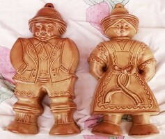 Ceramic gingerbread cookie cutter with a pair of male and female figures. Rare pieces of folk art