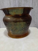 Large red copper pot with handmade decorations