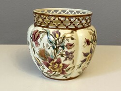 A porcelain ornament made by the master painter Zsolnay, a large floral pot
