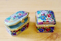 A pair of Millefiori jeweled porcelain mugs