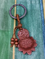 Real term.Rosewood keychain, lotus