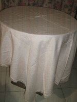 Beautiful powder pink woven tablecloth with lace edges