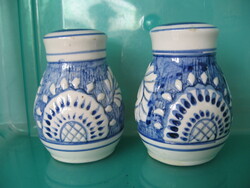 Pair of blue and white ceramic salt and pepper shakers and table spice holders