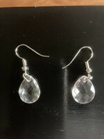 White plastic earrings with a glass effect