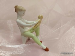 Aquincum porcelain figure, little girl with a teddy bear.