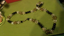 50 Cm, larger, necklace made of crystal and black glass beads.