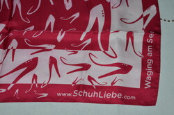 A scarf decorated with cool shoes