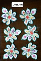 Hand-embroidered, leaf-shaped placemats