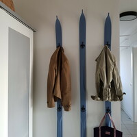 Wooden ski wall hanger