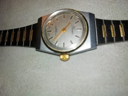 Watch 5. It is in the condition shown in the pictures