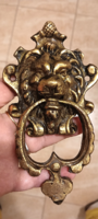 Copper lion head shaped door knocker