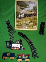 Retro American western toy train with steam wagons with circular track works with the box as shown in the pictures