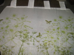 Beautiful vintage green floral butterfly on colorful stained glass curtains
