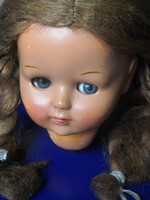 Marked doll head with movable eyes