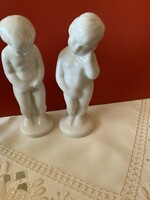 Porcelain white boy and girl figurines