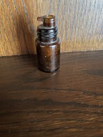 Old small medicine bottle with a dropper