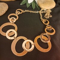 Gilded Israeli necklaces.