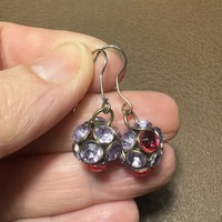 Old beautiful vintage plug-in earrings, metal earrings, the jewelry is from the 1970s