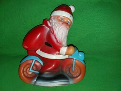 Antique Aradienca large Santa Claus on a bicycle rubber figure in good condition 19 cm according to pictures