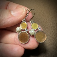 Old special vintage hook earrings, metal earrings, the jewelry is from the 1970s