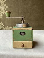 Old wooden coffee grinder.