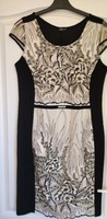Casual dress embroidered with black, gold and white flowers