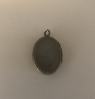 Pendant (openable) with old owner's lock of hair