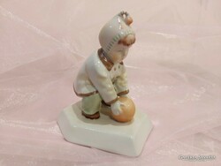 Zsolnay porcelain, boy with legs.