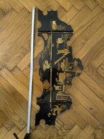 Japanese wood lacquer wall shelf with hand-painted motifs.