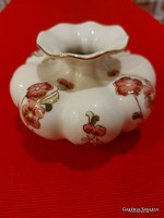 Zsolnay porcelain vase with flowers and ruffled edges.