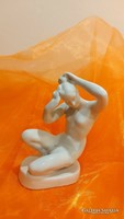 Aquincum porcelain, female nude sculpture combing her hair.