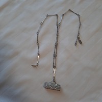 Metal necklace with a special metal pendant
