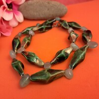 Old jade and porcelain beads.