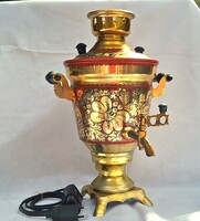 Old ornate, gilded, electric Russian samovar