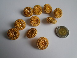 10 pcs. Light metal buttons shaped like flowers.