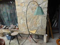 Old wrought iron floor lamp with simple lines
