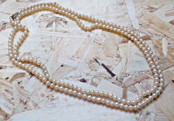 A long string of thinner glass tekla beads