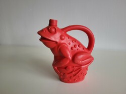 Old retro plastic watering can frog watering can