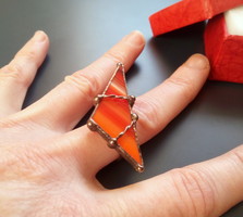 Extravagant red cocktail ring made of colored glass