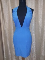 Light blue tight dress open at the back. Size Xs