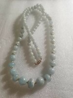 Pale blue marbled string of pearls