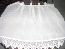 Beautifully placed stained glass curtain with lace tabs