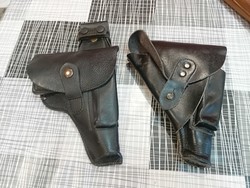 Leather holsters with practice pistols