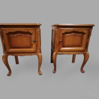 A pair of neobaroque bedside tables