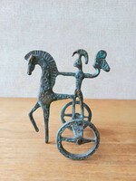 Retro metal work, goldsmith work. Etruscan horseman