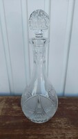 Polished, corked, crystal drinking glass
