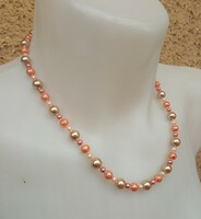 Fashion necklace with orange pearls