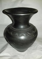 Women's Day 87!- A curious black ceramic vase of folk character