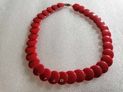 An interesting string of red beads