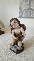 Antique carved, painted angel candle holder